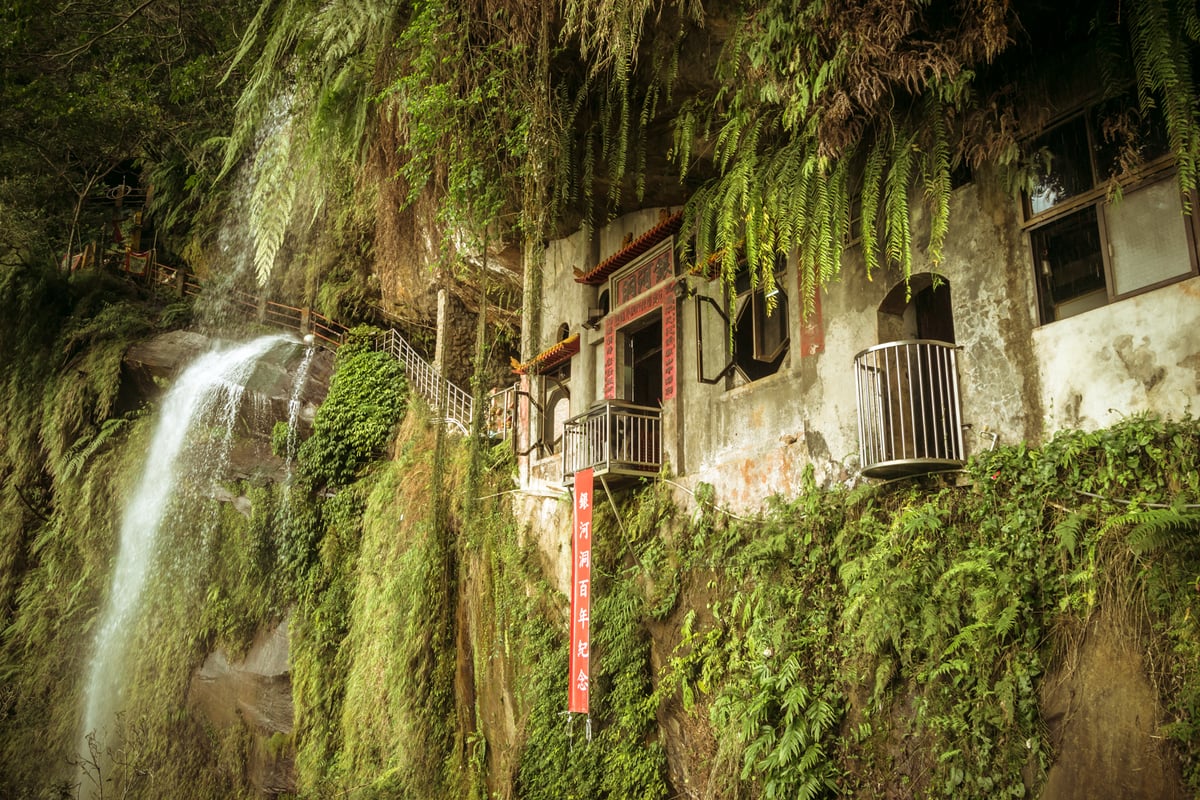 Yinhe cave temple and waterfall