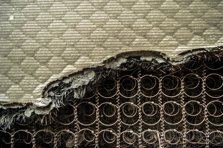 A mattress torn asunder