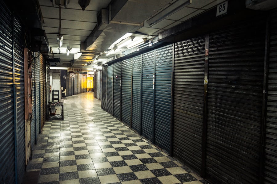 Metal shutters in a half-abandoned market in Zhongli