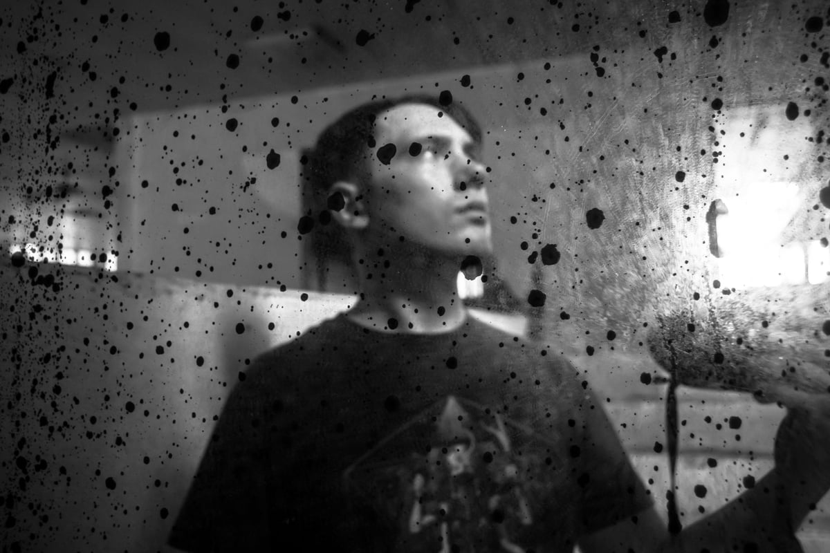 Self-Portrait in Mirrored Rust